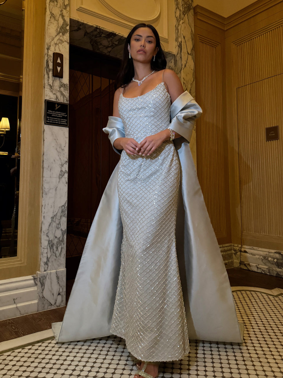 Beaded dress with cape